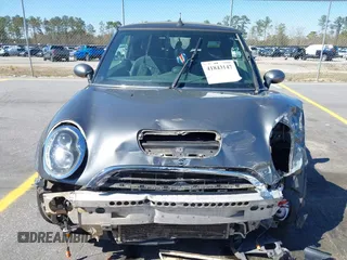 2005 MINI Convertible S with VIN WMWRH33545TF85051, listed as a IAAI auction lot 41843147 with 109,656 mi miles and . Bid and sale history available at DreamBid. Image 6.