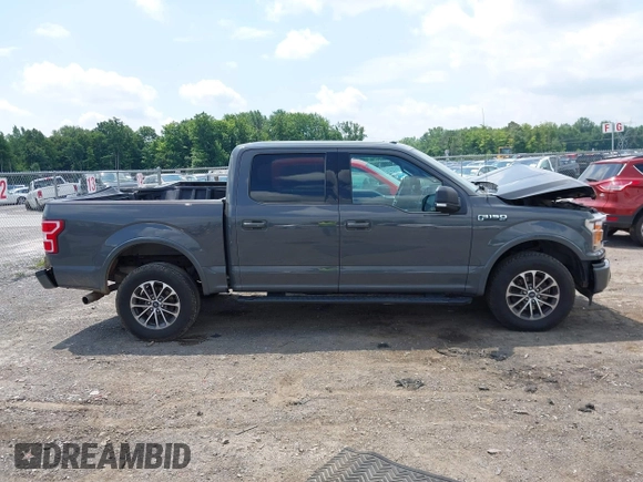2018 Ford F-150 XL with VIN 1FTEW1EPXJFD25656, listed as a IAAI auction lot 42650683 with 119,326 mi miles and . Bid and sale history available at DreamBid. Image 13.