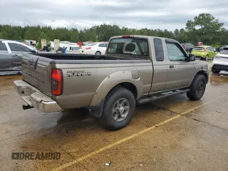 2004 Nissan Frontier XE Desert Runner z VIN 1N6ED26T84C448365, wystawiony jako Copart lot #56487435 z przebiegiem 266 738 mil mil oraz Tytuł czysty. Historia ofert i sprzedaży dostępna na DreamBid. Obrazek 3.