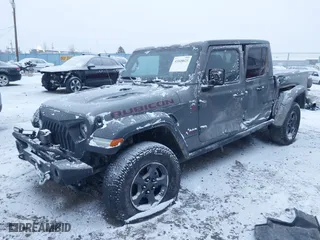 2020 Jeep Gladiator Rubicon with VIN 1C6JJTBG3LL146075, listed as a IAAI auction lot 41048823 with 130,318 mi miles. Bid and sale history available at carsss.com. Image 17.