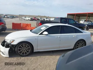 2017 Audi A6 Premium z VIN WAUF8AFC1HN100842, wystawiony jako IAAI lot #42024333 z przebiegiem 89 275 mil mil oraz . Historia ofert i sprzedaży dostępna na DreamBid. Obrazek 15.