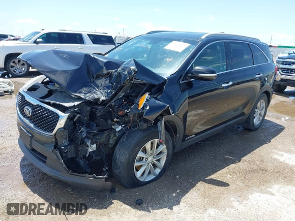 2016 Kia Sorento LX with VIN 5XYPGDA50GG012567, listed as a IAAI auction lot 42074624 with 107,605 mi miles and . Bid and sale history available at DreamBid. Image 2.