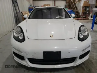 2016 Porsche Panamera 4 z VIN WP0AA2A71GL001868, wystawiony jako Copart lot #55299865 z przebiegiem 188 141 mil mil oraz Czysty tytuł • Clean title. Historia ofert i sprzedaży dostępna na DreamBid. Obrazek 5.