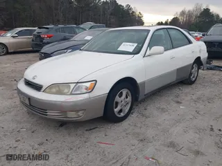 1999 Lexus ES 300 Luxury Sport Sdn with VIN JT8BF28G9X0231427, listed as a IAAI auction lot 41317650 with 317,148 mi miles. Bid and sale history available at carsss.com. Image 19.