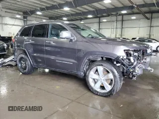 2016 Jeep Grand Cherokee Overland with VIN 1C4RJFCG9GC345309, listed as a Copart auction lot 61095285 with 115,968 mi miles and Salvage title. Bid and sale history available at DreamBid. Image 4.