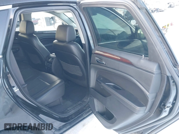 2015 Cadillac SRX Premium Collection with VIN 3GYFNGE38FS593965, listed as a IAAI auction lot 41602374 with 97,949 mi miles. Bid and sale history available at carsss.com. Image 8.