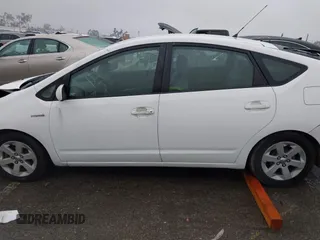 2007 Toyota Prius z VIN JTDKB20U177622142, wystawiony jako IAAI lot #41720920 z przebiegiem 140 665 mil mil oraz . Historia ofert i sprzedaży dostępna na DreamBid. Obrazek 14.