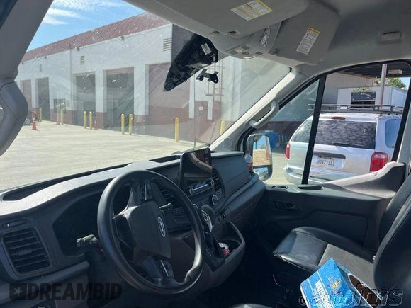2021 Ford Transit Cargo with VIN 1FTBR1C83MKA20226, listed as a IAAI auction lot 42835281 with 53,381 mi miles and . Bid and sale history available at DreamBid. Image 5.