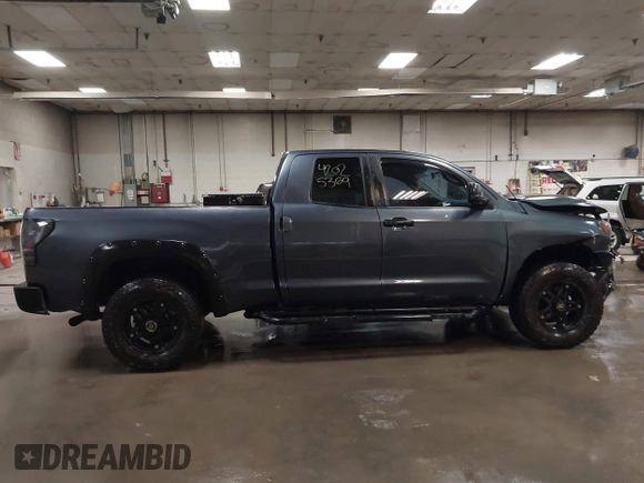 2009 Toyota Tundra 4WD Truck with VIN 5TFBW54199X091510, listed as a IAAI auction lot 42025369 with 234,784 mi miles. Bid and sale history available at carsss.com. Image 13.