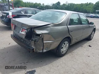 2001 Toyota Camry CE z VIN 4T1BG22K51U032141, wystawiony jako IAAI lot #42332835 z przebiegiem 143 313 mil mil oraz . Historia ofert i sprzedaży dostępna na DreamBid. Obrazek 4.