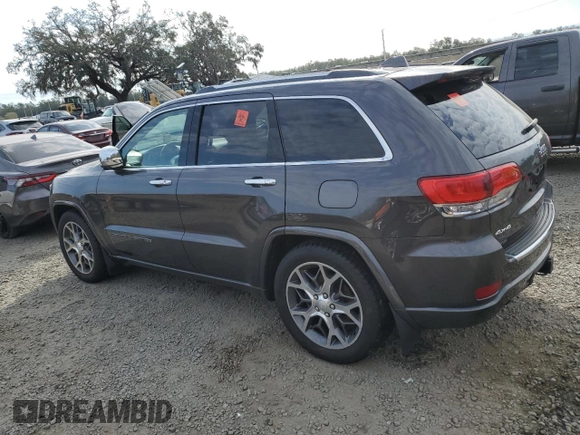 2021 Jeep Grand Cherokee Overland with VIN 1C4RJFCG9MC620320, listed as a Copart auction lot 85609814 with 61,335 mi miles and Salvage title. Bid and sale history available at DreamBid. Image 2.