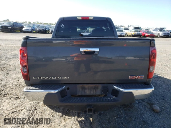 2012 GMC Canyon SLE1 with VIN 1GTH6MFEXC8131115, listed as a Copart auction lot 51373225 with 150,767 mi miles and Clean Title. Bid and sale history available at carsss.com. Image 6.