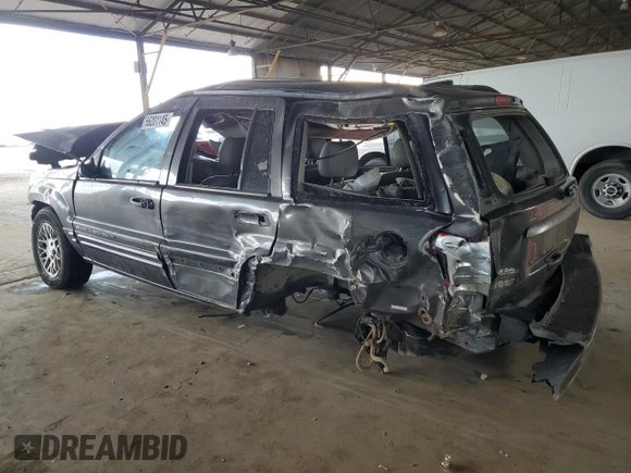 2002 Jeep Grand Cherokee Limited with VIN 1J8GX58N72C294837, listed as a Copart auction lot 56201145 with 218,345 mi miles and Salvage Title. Bid and sale history available at DreamBid. Image 2.