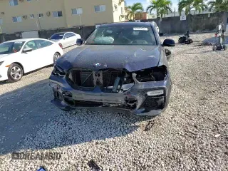 2021 BMW X6 M50i with VIN 5UXCY8C09M9E66884, listed as a Copart auction lot 63025622 with 26,220 mi miles and Salvage Title. Bid and sale history available at carsss.com. Image 11.