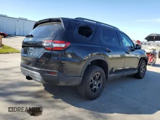 2025 Honda Pilot TrailSport z VIN 5FNYG1H61SB036233, wystawiony jako Copart lot #47130495 z przebiegiem Nie podano mil oraz Szkoda całkowita • Salvage title. Historia ofert i sprzedaży dostępna na DreamBid. Obrazek 3.