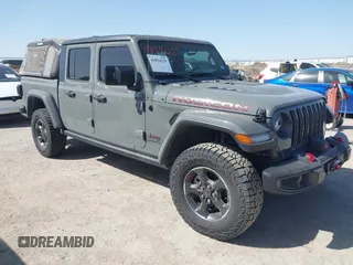 2022 Jeep Gladiator Rubicon z VIN 1C6JJTBG2NL167034, wystawiony jako IAAI lot #41854225 z przebiegiem Nie podano mil oraz . Historia ofert i sprzedaży dostępna na DreamBid. Obrazek 1.