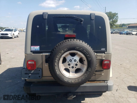 2003 Jeep Wrangler Sahara with VIN 1J4FA59S23P303845, listed as a Copart auction lot 68101244 with 141,753 mi miles and Clean Title. Bid and sale history available at carsss.com. Image 6.