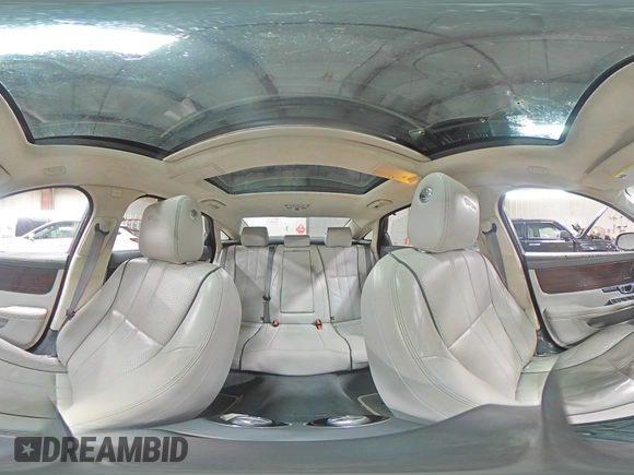 2014 Jaguar XJ Portfolio with VIN SAJWJ2GD5E8V69562, listed as a Copart auction lot 87737195 with 100,525 mi miles and Salvage title. Bid and sale history available at DreamBid. Image 15.