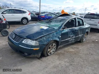 2001 Volkswagen Passat GLX with VIN WVWTH63B51E124484, listed as a IAAI auction lot 42043719 with 42,585 mi miles. Bid and sale history available at carsss.com. Image 2.