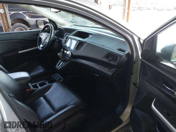 2015 Honda CR-V EX-L with VIN 2HKRM4H72FH616198, listed as a IAAI auction lot 42038752 with 82,826 mi miles and . Bid and sale history available at carsss.com. Image 5.