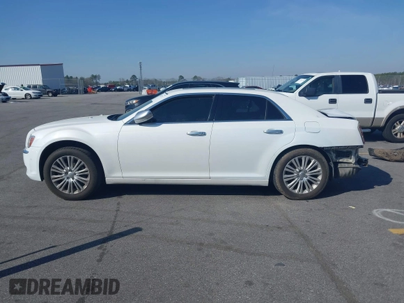 2013 Chrysler 300 Luxury Series with VIN 2C3CCASGXDH573689, listed as a IAAI auction lot 41782712 with 204,746 mi miles and . Bid and sale history available at DreamBid. Image 15.