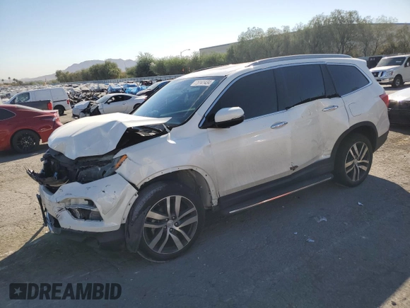 2017 Honda Pilot Touring with VIN 5FNYF6H92HB092491, listed as a Copart auction lot 76141434 with 56,002 mi miles and Salvage Title. Bid and sale history available at carsss.com. Image 1.