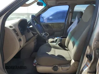2001 Ford Escape XLT with VIN 1FMCU04101KF61126, listed as a Copart auction lot 76174744 with 0 mi miles and Salvage Title. Bid and sale history available at carsss.com. Image 7.