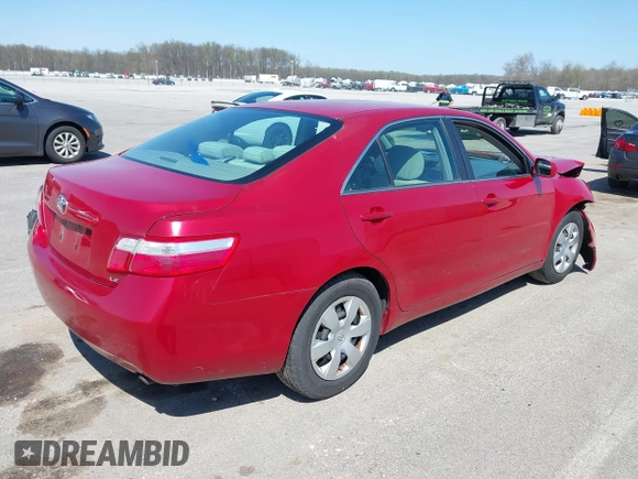 2007 Toyota Camry CE with VIN 4T1BE46K47U026559, listed as a IAAI auction lot 41969062 with 248,730 mi miles. Bid and sale history available at carsss.com. Image 4.