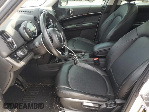 2019 MINI Countryman Cooper with VIN WMZYV5C51K3F58680, listed as a Copart auction lot 67230974 with 58,029 mi miles and Salvage Title. Bid and sale history available at carsss.com. Image 7.