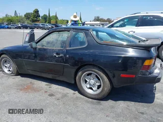 1984 Porsche 944 with VIN WP0AA0947EN459060, listed as a IAAI auction lot 42215176 with 43,863 mi miles and . Bid and sale history available at carsss.com. Image 14.