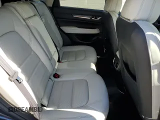 2018 Mazda CX-5 Grand Touring z VIN JM3KFBDM5J0379246, wystawiony jako Copart lot #58587865 z przebiegiem 46 339 mil mil oraz Szkody całkowita. Historia ofert i sprzedaży dostępna na DreamBid. Obrazek 11.
