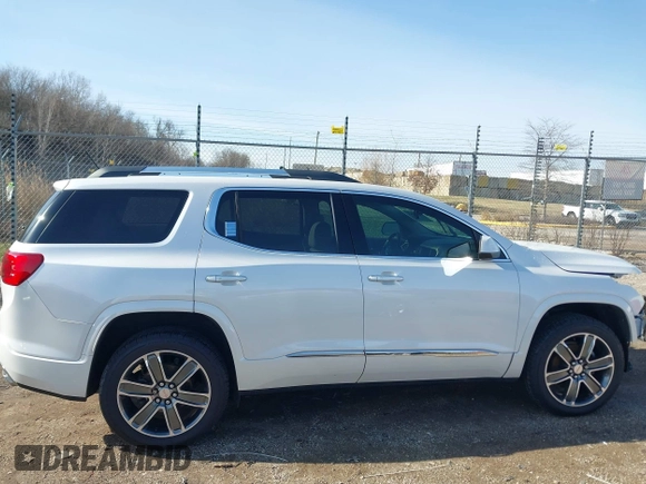 2019 GMC Acadia Denali with VIN 1GKKNXLSXKZ173883, listed as a IAAI auction lot 41863843 with 85,067 mi miles and . Bid and sale history available at carsss.com. Image 13.