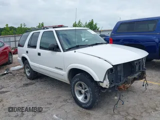 2004 Chevrolet Blazer LS z VIN 1GNCS13X44K169235, wystawiony jako IAAI lot #42352172 z przebiegiem 171 065 mil mil oraz . Historia ofert i sprzedaży dostępna na DreamBid. Obrazek 1.