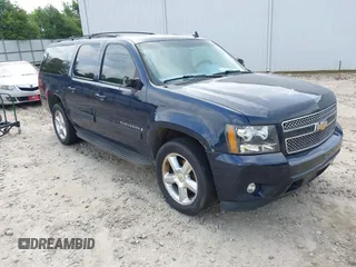 2009 Chevrolet Suburban 2LT z VIN 1GNFC260X9R257882, wystawiony jako IAAI lot #42412614 z przebiegiem 280 631 mil mil oraz . Historia ofert i sprzedaży dostępna na DreamBid. Obrazek 1.
