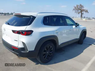 2024 Mazda CX-50 S Select with VIN 7MMVABAM2RN242725, listed as a IAAI auction lot 41477519 with 4,808 mi miles and . Bid and sale history available at DreamBid. Image 4.