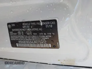 2018 BMW 3 Series 330i xDrive with VIN WBA8D9G54JNU72412, listed as a IAAI auction lot 40660769 with 58,668 mi miles. Bid and sale history available at carsss.com. Image 9.