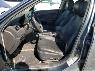 2012 Ford Fusion Hybrid with VIN 3FADP0L33CR258753, listed as a Copart auction lot 74201724 with 158,434 mi miles and Salvage title. Bid and sale history available at DreamBid. Image 7.