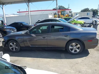 2013 Dodge Charger SE with VIN 2C3CDXBGXDH688230, listed as a IAAI auction lot 41634325 with 133,519 mi miles. Bid and sale history available at carsss.com. Image 14.