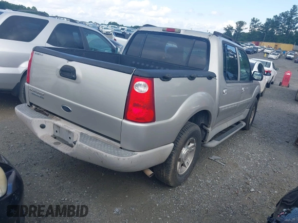 2003 Ford Explorer Sport Trac XLS z VIN 1FMZU67E63UC48939, wystawiony jako IAAI lot #42526151 z przebiegiem 221 402 mil mil oraz . Historia ofert i sprzedaży dostępna na DreamBid. Obrazek 4.