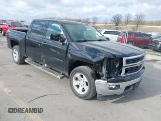 2014 Chevrolet Silverado 1500 LT with VIN 3GCUKREC4EG438512, listed as a IAAI auction lot 41008643 with 190,099 mi miles and . Bid and sale history available at DreamBid. Image 1.