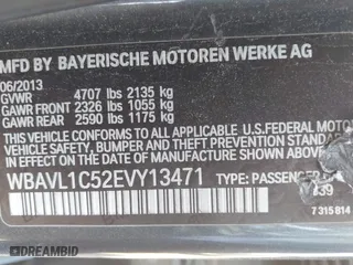 2014 BMW X1 xDrive28i with VIN WBAVL1C52EVY13471, listed as a IAAI auction lot 41828415 with 1 mi miles. Bid and sale history available at carsss.com. Image 9.
