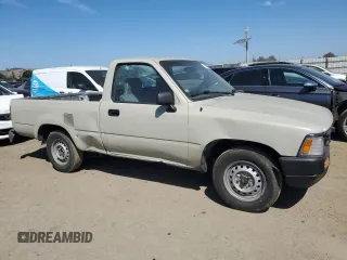 1992 Toyota Pickup z VIN JT4RN81A1N0094217, wystawiony jako Copart lot #56062545 z przebiegiem 242 256 mil mil oraz Szkoda całkowita • Salvage title. Historia ofert i sprzedaży dostępna na DreamBid. Obrazek 4.