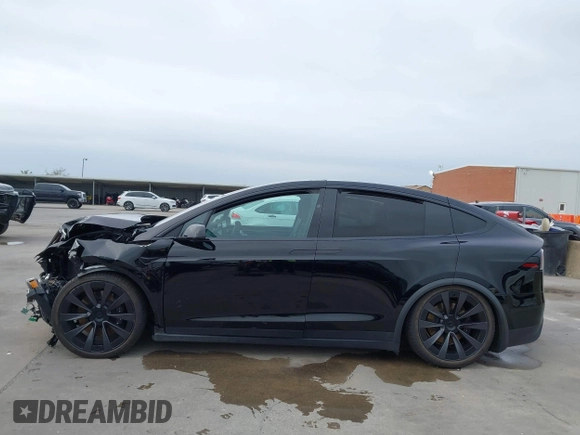 2023 Tesla Model X Plaid with VIN 7SAXCBE63PF376320, listed as a IAAI auction lot 40954738 with Not Provided miles and . Bid and sale history available at DreamBid. Image 15.
