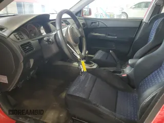 2005 Mitsubishi Lancer Evolution VIII z VIN JA3AH86DX5U016842, wystawiony jako Copart lot #51257475 z przebiegiem 72 698 mil mil oraz Szkoda całkowita • Salvage title. Historia ofert i sprzedaży dostępna na DreamBid. Obrazek 7.