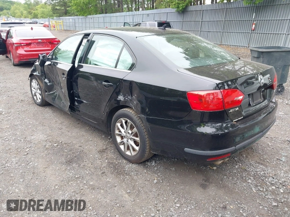 2013 Volkswagen Jetta SE with VIN 3VWDP7AJ7DM212911, listed as a IAAI auction lot 42307323 with 128,745 mi miles and . Bid and sale history available at DreamBid. Image 3.