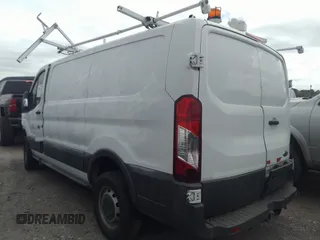 2016 Ford Transit Cargo z VIN 1FTYR1YM0GKB55345, wystawiony jako IAAI lot #40200213 z przebiegiem 121 480 mil mil oraz . Historia ofert i sprzedaży dostępna na DreamBid. Obrazek 3.