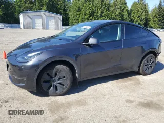 2024 Tesla Model Y Long Range with VIN 7SAYGDEE9RF120729, listed as a Copart auction lot 57360265 with 21,589 mi miles and Salvage title. Bid and sale history available at DreamBid. Image 1.