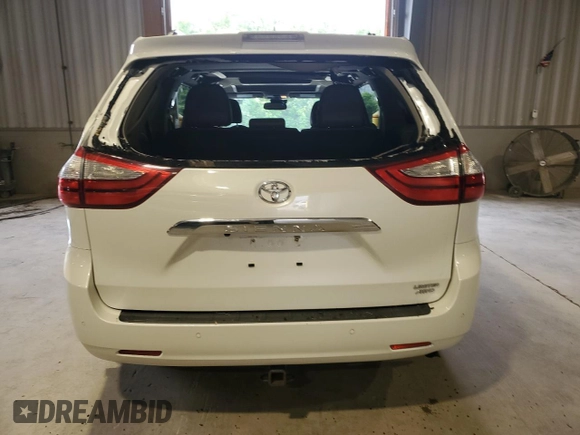 2018 Toyota Sienna XLE with VIN 5TDDZ3DC9JS204307, listed as a Copart auction lot 57327715 with 70,886 mi miles and Salvage title. Bid and sale history available at DreamBid. Image 6.