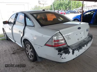 2008 Ford Taurus SEL z VIN 1FAHP24W68G143505, wystawiony jako IAAI lot #41932592 z przebiegiem 238 542 mil mil oraz . Historia ofert i sprzedaży dostępna na DreamBid. Obrazek 3.