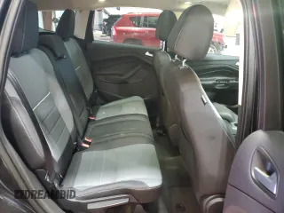 2014 Ford Escape SE with VIN 1FMCU9G99EUA06336, listed as a Copart auction lot 53871065 with 117,457 mi miles and Salvage title. Bid and sale history available at DreamBid. Image 11.